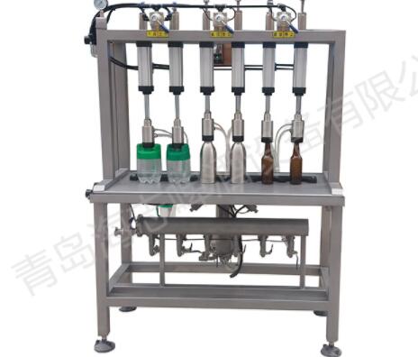 山東青島啤酒廠訂購10臺啤酒灌裝機
